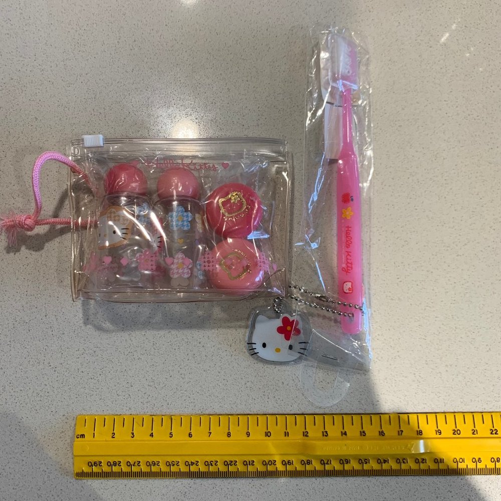 HELLO KITTY TRAVEL TOOTHBRUSH + LOTION BOTTLES